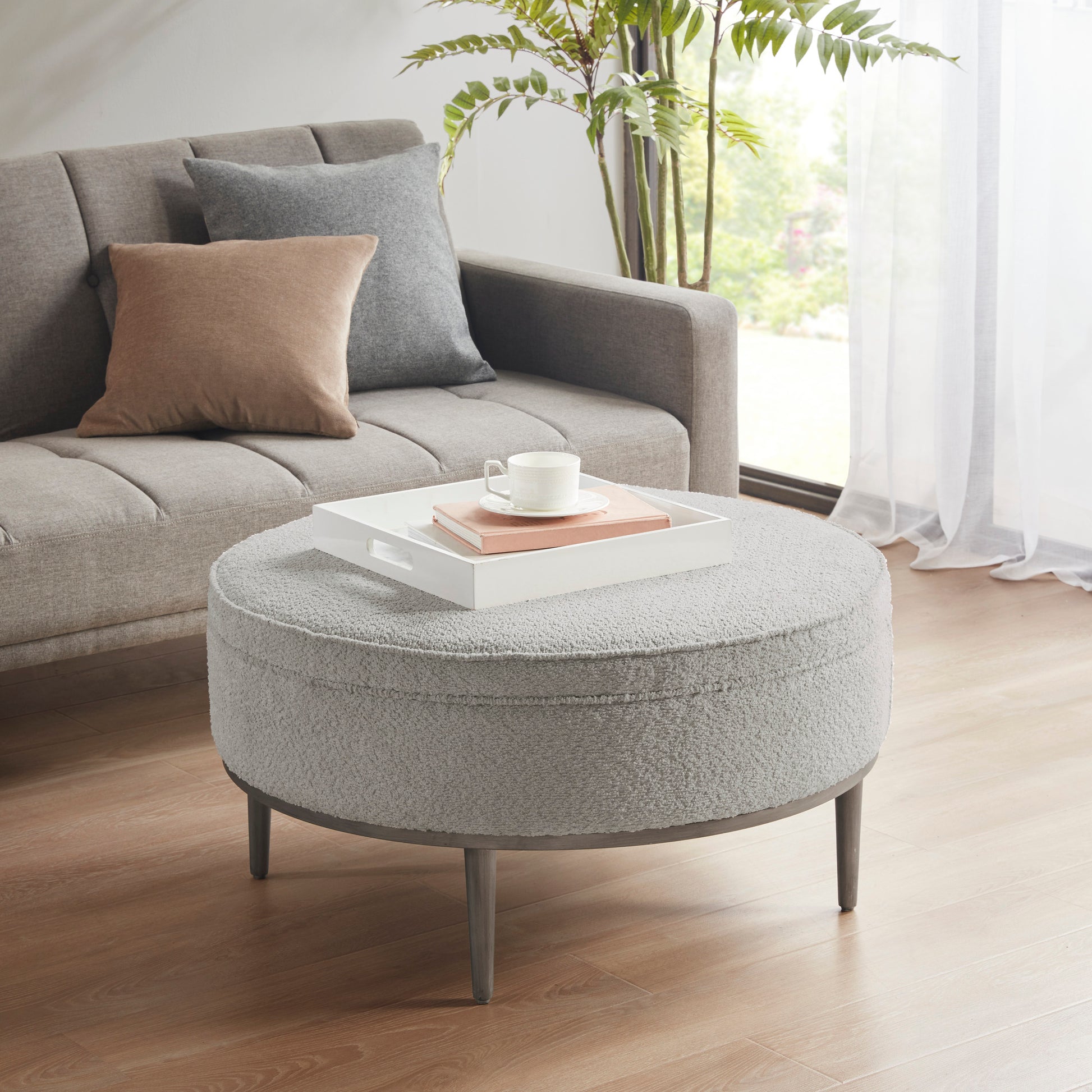 Madison Park Upholstered Round Cocktail Ottoman with Metal Base 34" Dia