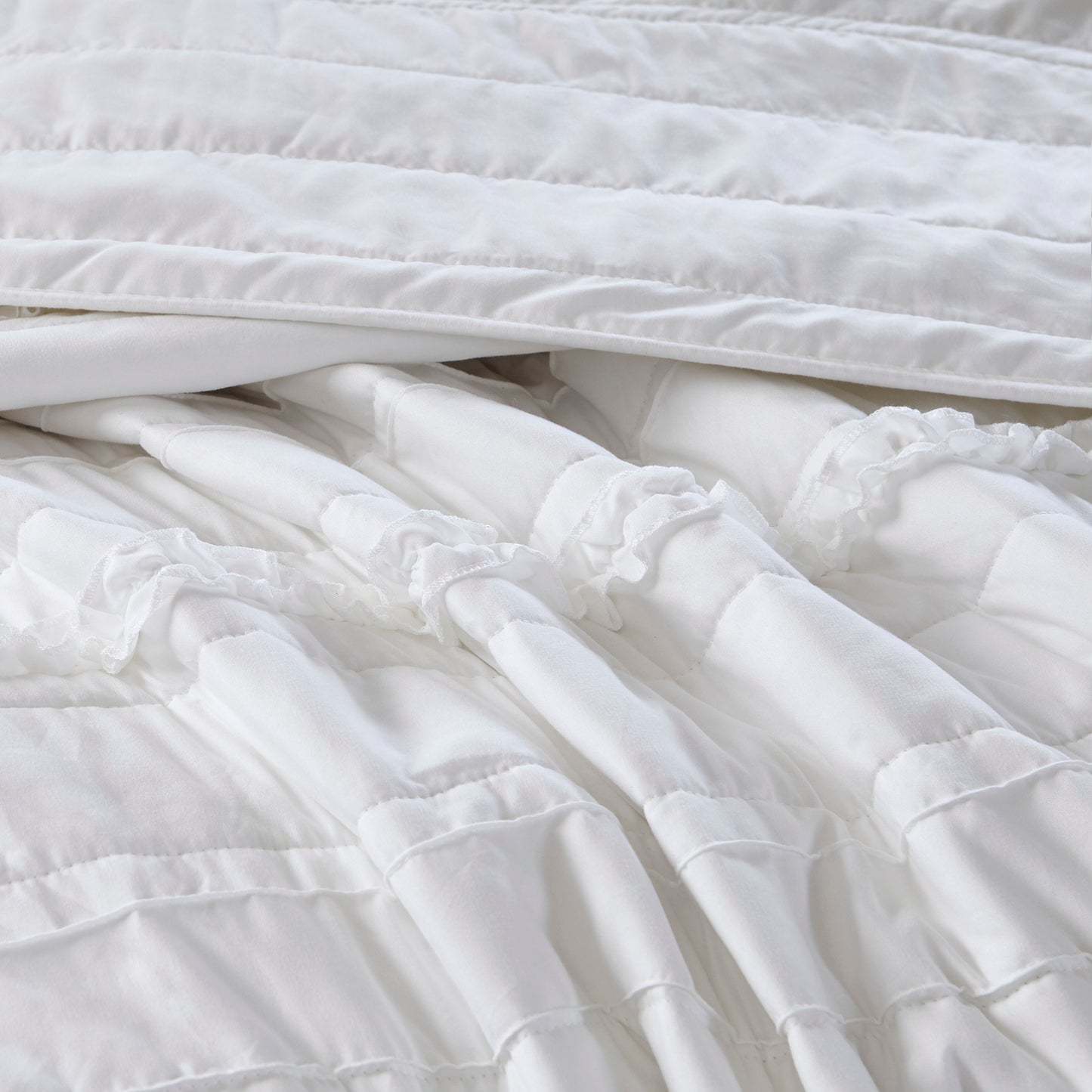 Madison Park 4 Piece Microfiber Reversible Ruffle Quilt Set with Throw Pillow